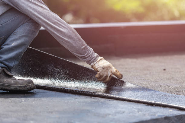 Professional Emergency Waterproofing technician working in Narberth, PA